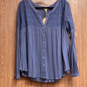 Royal blue long sleeve peasant top with eyelet yoke.